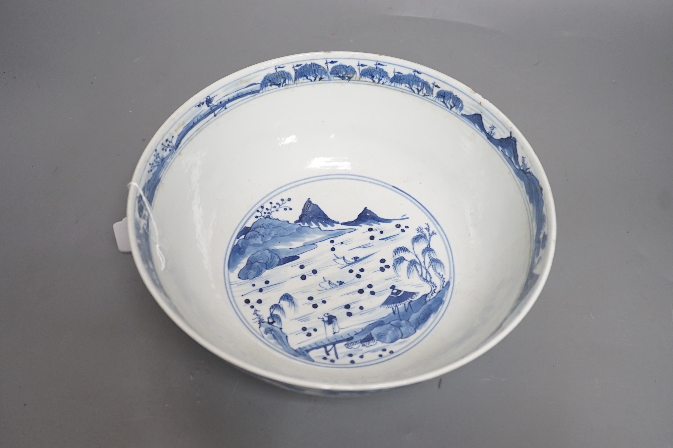 A 19th century Chinese blue and white landscape bowl, 26cm